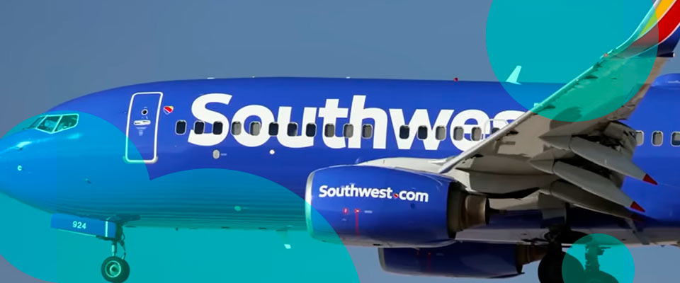 Southwest Airlines Flight maneuvers to avoid midair conflict; two crew members injured